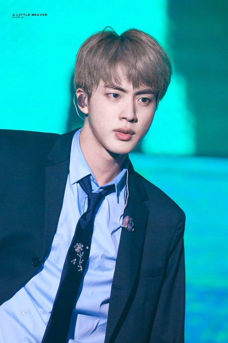 How Jin S Worldwide Handsome Face Overpowered His Bad Haircut