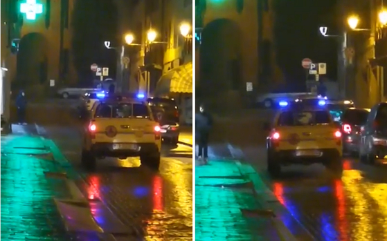 이탈리아 경찰차가 골목을 다니며 확성기로 "외출을 자제하라"고 권고하는 모습. [유튜브 캡처] 