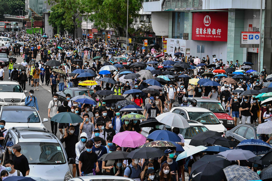 홍콩에선 24일 중국이 홍콩을 대신해 제정하는 '홍콩판 국가보안법'에 반대하는 시위가 벌어졌다. [AFP=연합뉴스]