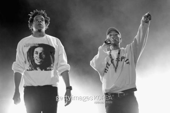 VIRGINIA BEACH, VIRGINIA - APRIL 27: Jay-Z and Pharrell perform onstage at SOMETHING IN THE WATER - Day 2 on April 27, 2019 in Virginia Beach City. (Photo by Brian Ach/Getty Images for Something in the Water)