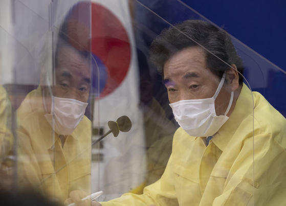 Lee Nak-yeon, representative of the Democratic Party of Korea, who is the chairman of the Corona 19 National Crisis Overcoming Committee, is speaking at the first plenary session of the Corona 19 National Crisis Overcoming Committee held at the National Assembly in Yeouido, Seoul, on the afternoon of the 8th.[연합뉴스]