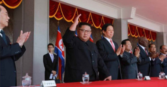 In 2015, during a parade ceremony marking the 70th anniversary of the founding of the Democratic People's Republic of Korea and a military demonstration in Pyongyang, the Chairman of the State Council, Kim Jong-un, raised his hand. [노동신문]