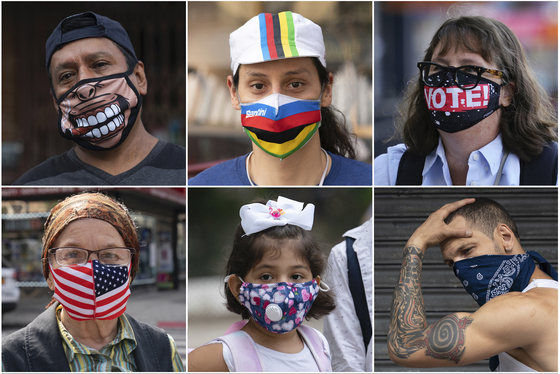 New Yorkers with masks.  AP = Yonhap News