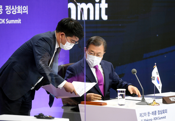 President Moon Jae-in is preparing for the meeting by attending the second Korea-Mekong video summit held in the main building of the Blue House on the 13th. Photo reporters from the Blue House