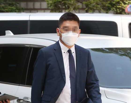 The appearance of former Channel A reporter Lee Dong-jae, one of the main parts of this case.  The former reporter is on trial after being arrested on charges of attempting to be coerced. [연합뉴스]