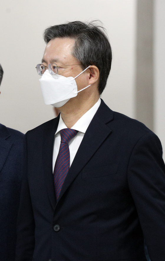 Woo Byeong-woo, a former head of the Blue House, who is accused of illegal inspection, attends an appeal trial held at the Seoul High Court on the 12th. [뉴스1]