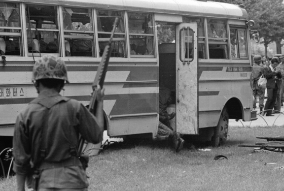 On August 23, 1971, Silmido operatives escaped en masse and then destroyed themselves in the middle of Seoul with grenades.  Subsequently, four surviving officers were executed and secretly buried.  Central photo