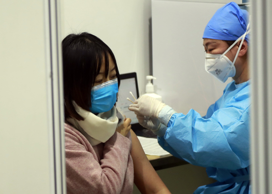중국이 올해 안에 8 억 8 천만 명을 예방 접종 … “내년 올림픽 행사”